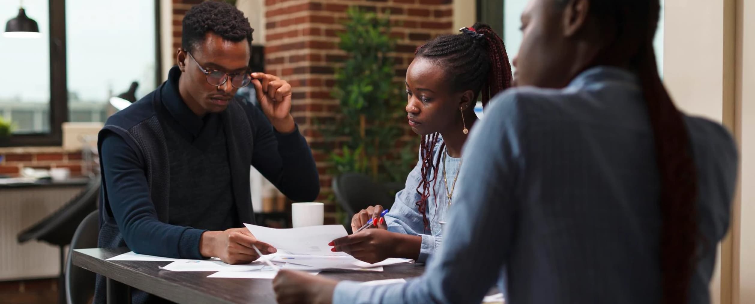 people discussing in a meeting setting